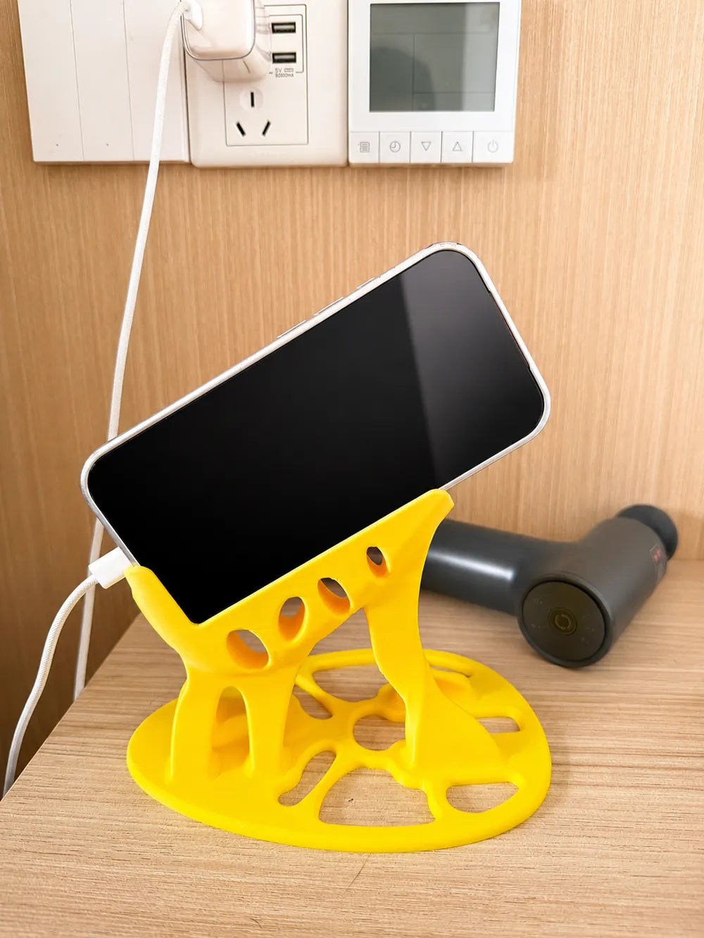 Support de téléphone pour position allongée